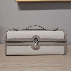 Savette Slim Symmetry canvas-trimmed leather clutch